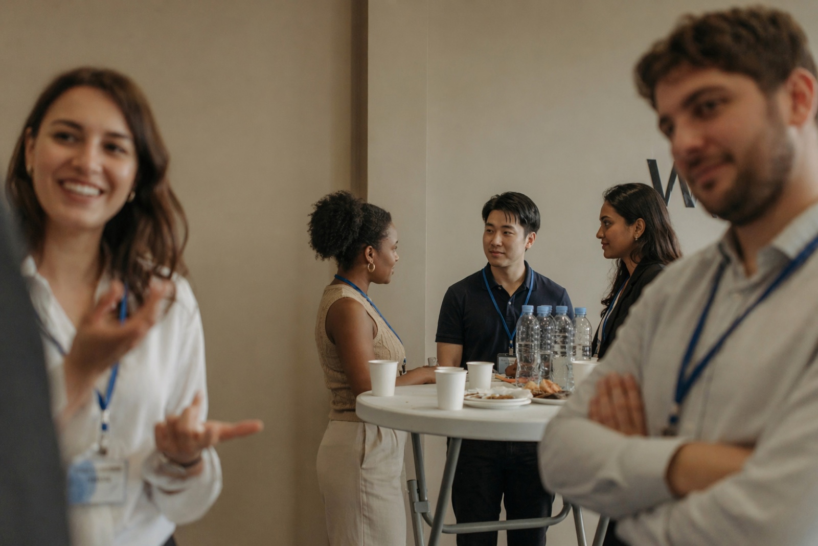 Professionals speaking at a networking event