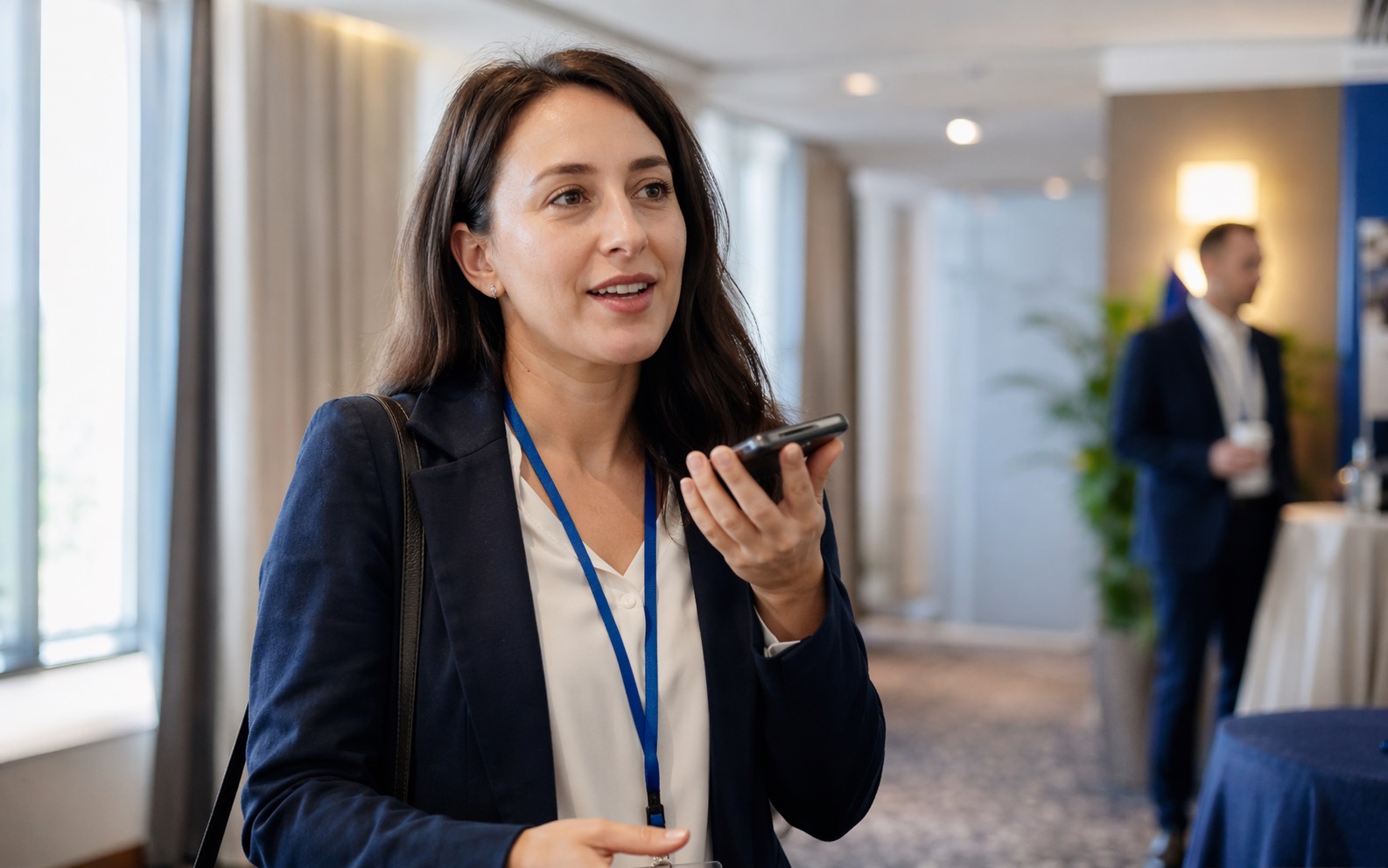Professional recording a voice note after a networking conversation